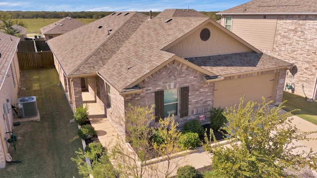 view of front of home with central air condition unit