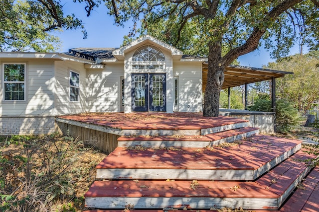 wooden deck with french doors