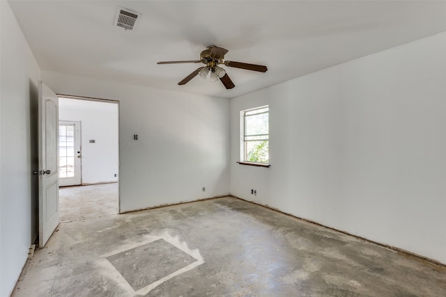 empty room with plenty of natural light and ceiling fan