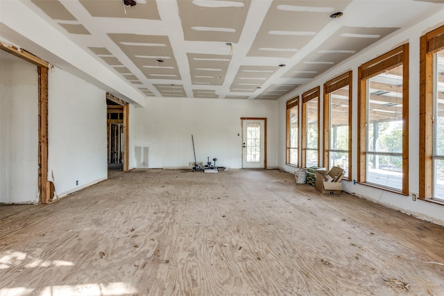 unfurnished room featuring plenty of natural light