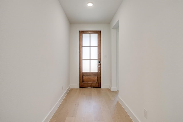 doorway to outside with light hardwood / wood-style floors