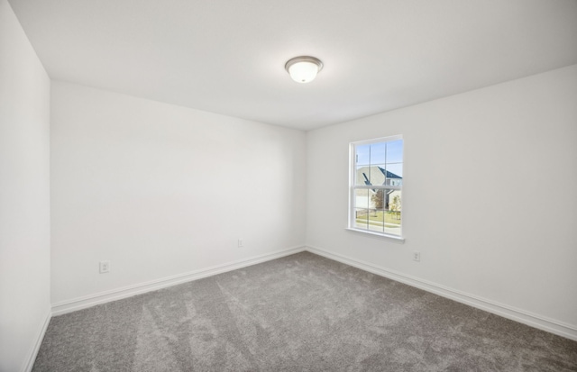 unfurnished room with carpet floors