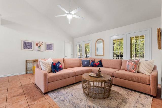 living room with french doors, high vaulted ceiling, light tile patterned floors, and ceiling fan