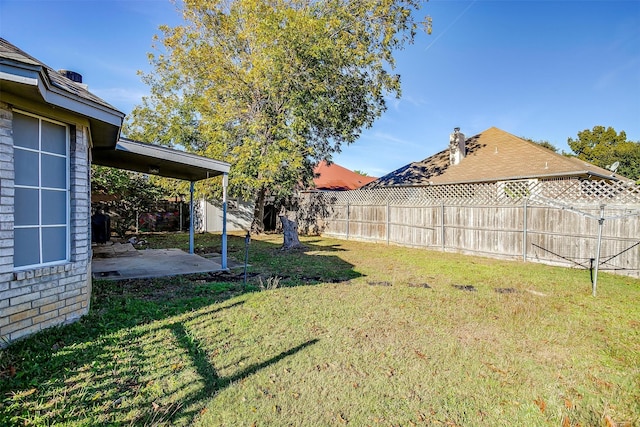 view of yard with a patio area