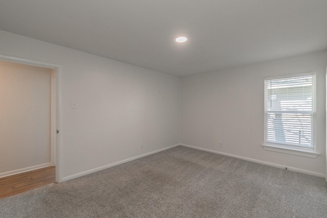 unfurnished room featuring carpet floors