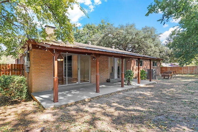 back of house featuring a patio