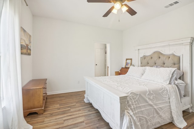 bedroom featuring ceiling fan and light wood-type flooring