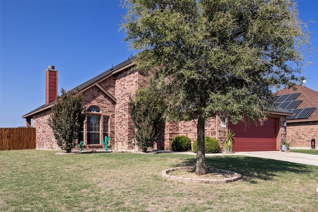 view of front facade featuring a garage and a front yard