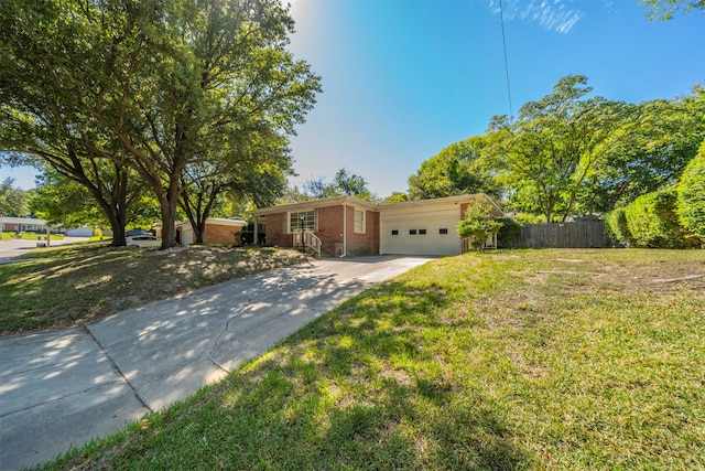 ranch-style house with a front lawn and a garage