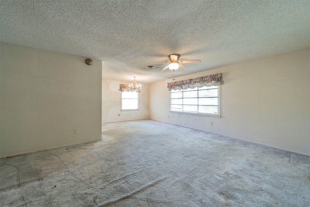 unfurnished room with light carpet, a textured ceiling, and ceiling fan