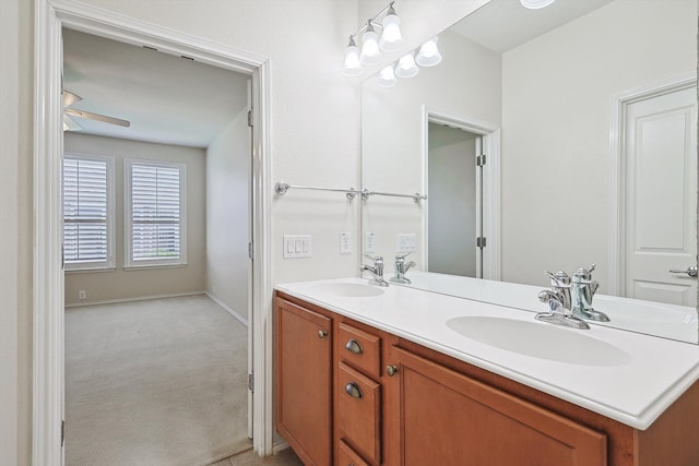 bathroom featuring vanity and ceiling fan