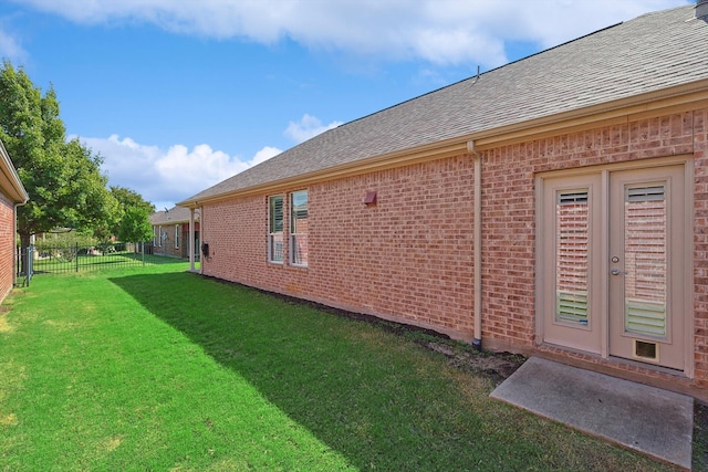 exterior space with a yard