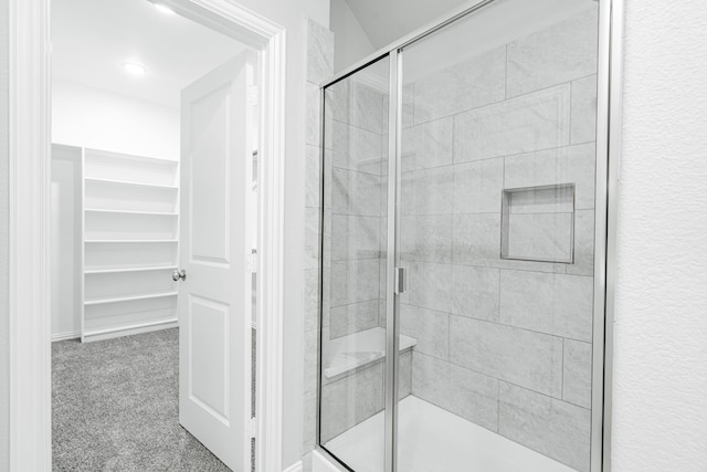 bathroom with an enclosed shower