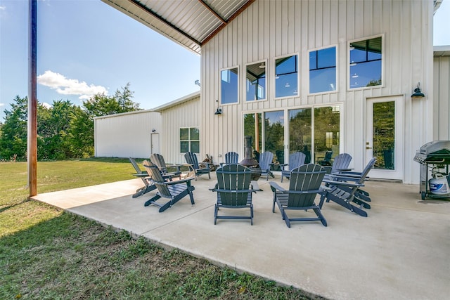 view of patio / terrace with a grill and an outdoor fire pit