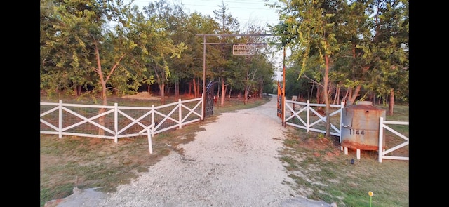 view of gate featuring fence