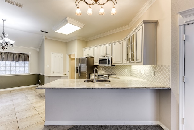 kitchen with light stone counters, decorative backsplash, stainless steel appliances, kitchen peninsula, and ornamental molding