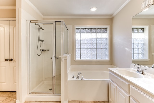 bathroom with crown molding, vanity, and independent shower and bath