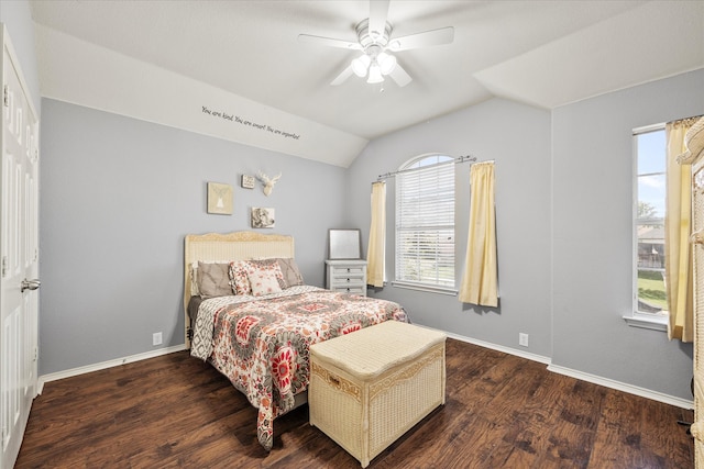 bedroom featuring vaulted ceiling, dark hardwood / wood-style flooring, and ceiling fan