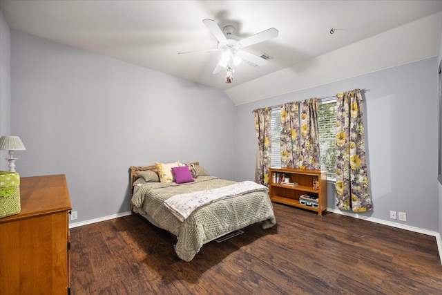 bedroom featuring lofted ceiling, ceiling fan, and dark wood-type flooring