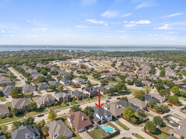 drone / aerial view with a water view