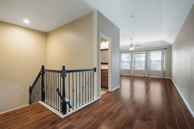 hall featuring dark wood-type flooring