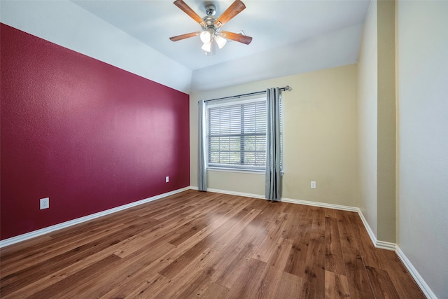 unfurnished room with hardwood / wood-style floors and ceiling fan