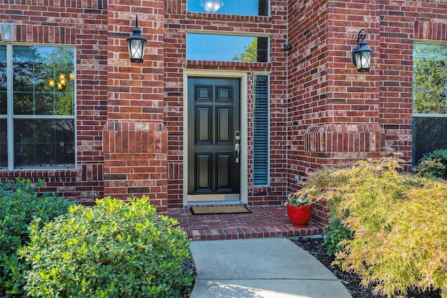 1310 Gold Coast Dr, Rockwall, TX 75087 - property entrance featuring brick siding