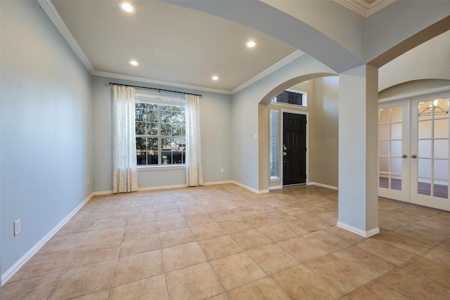 1310 Gold Coast Dr, Rockwall, TX 75087 - spare room with french doors, recessed lighting, ornamental molding, and arched walkways