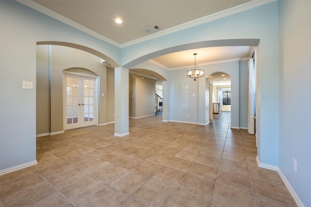 1310 Gold Coast Dr, Rockwall, TX 75087 - empty room with a chandelier, crown molding, stairs, visible vents, and arched walkways