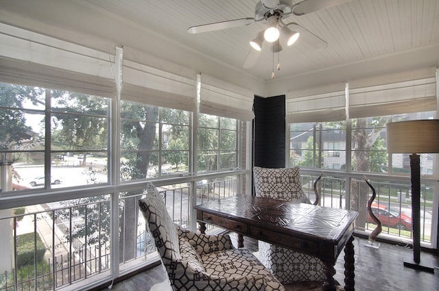 sunroom / solarium with ceiling fan