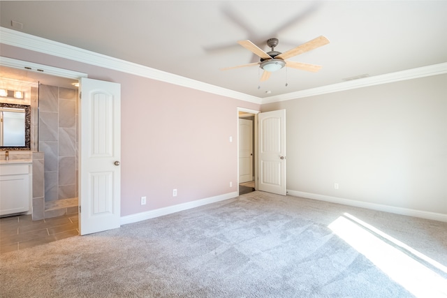 unfurnished bedroom with ceiling fan, light colored carpet, connected bathroom, and ornamental molding