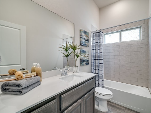 full bathroom with vanity, hardwood / wood-style flooring, shower / bathtub combination with curtain, and toilet