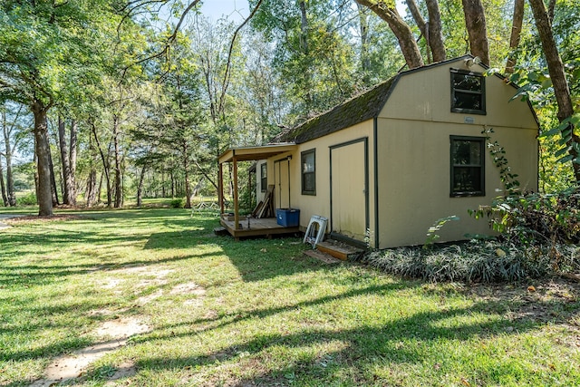 view of yard featuring a wooden deck