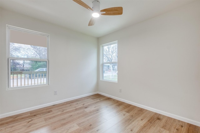 unfurnished room featuring light hardwood / wood-style floors and ceiling fan