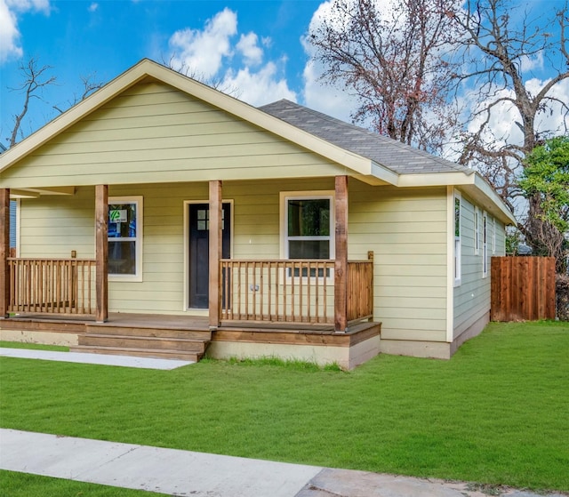 bungalow-style home featuring a front yard and a porch