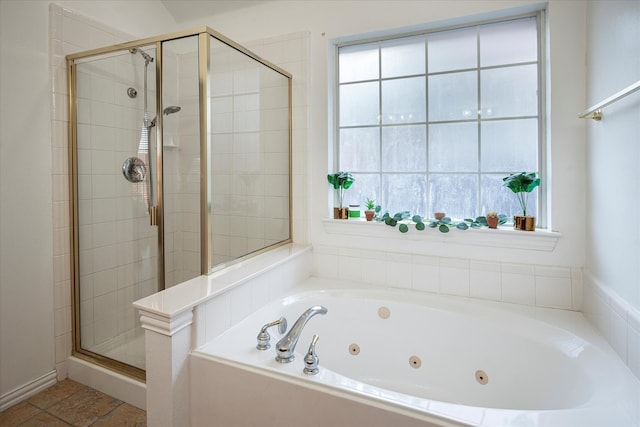 bathroom featuring plus walk in shower