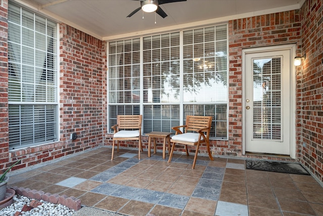 view of patio with ceiling fan