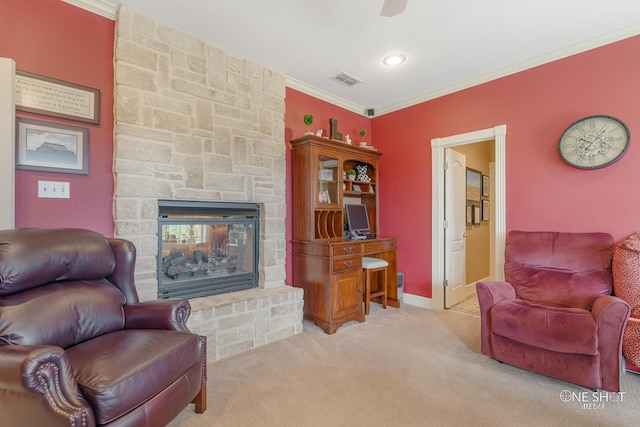 living room featuring a fireplace, light colored carpet, and ornamental molding