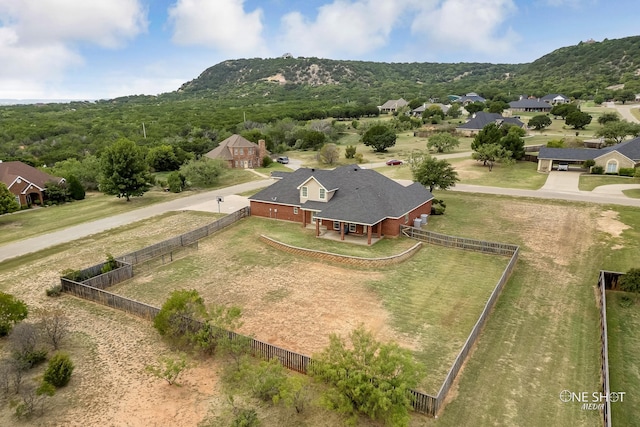 drone / aerial view featuring a mountain view