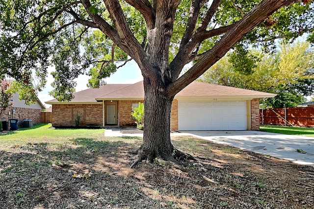 single story home featuring a garage