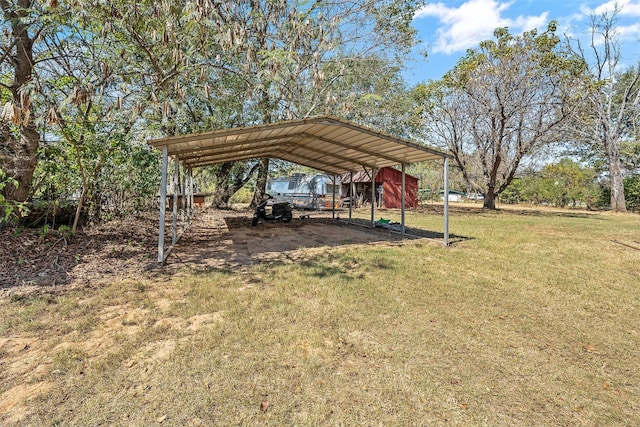 view of yard with a carport