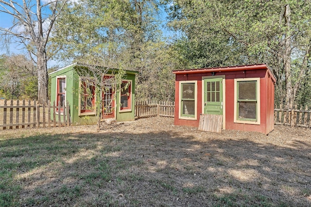 view of outdoor structure with a lawn