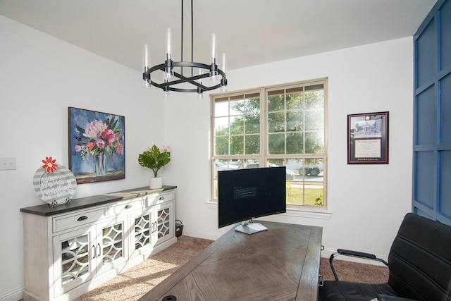 carpeted office with a chandelier