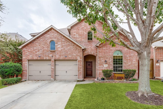 front facade with a front yard and a garage