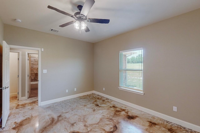 spare room with ceiling fan