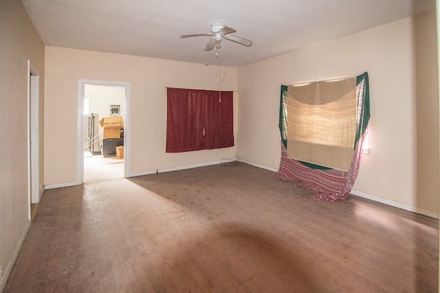 unfurnished room featuring hardwood / wood-style floors and ceiling fan