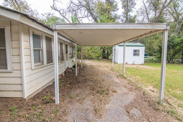 view of parking / parking lot with a yard