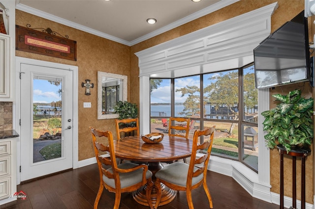7550 S Lakeshore Dr, Shreveport, LA 71119 - dining space featuring baseboards, crown molding, dark wood-type flooring, and recessed lighting