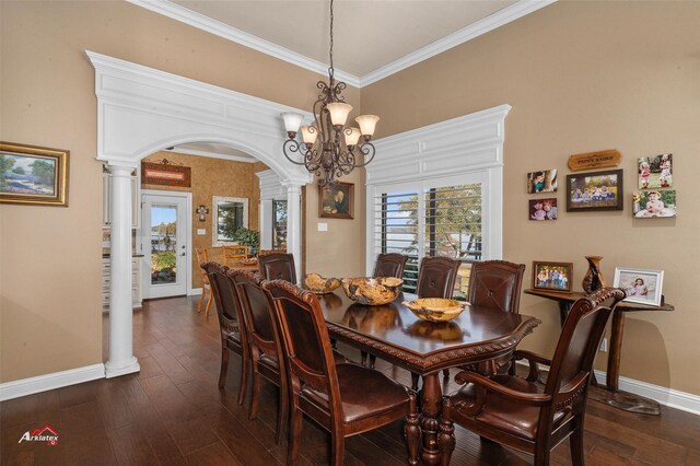 7550 S Lakeshore Dr, Shreveport, LA 71119 - dining area featuring ornate columns, arched walkways, crown molding, baseboards, and a chandelier