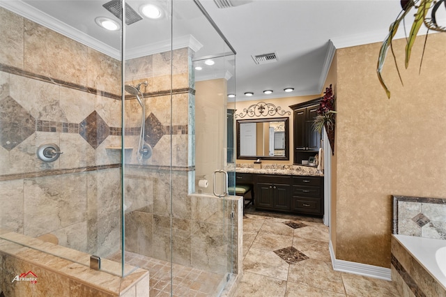 bathroom with tile patterned floors, crown molding, separate shower and tub, and vanity